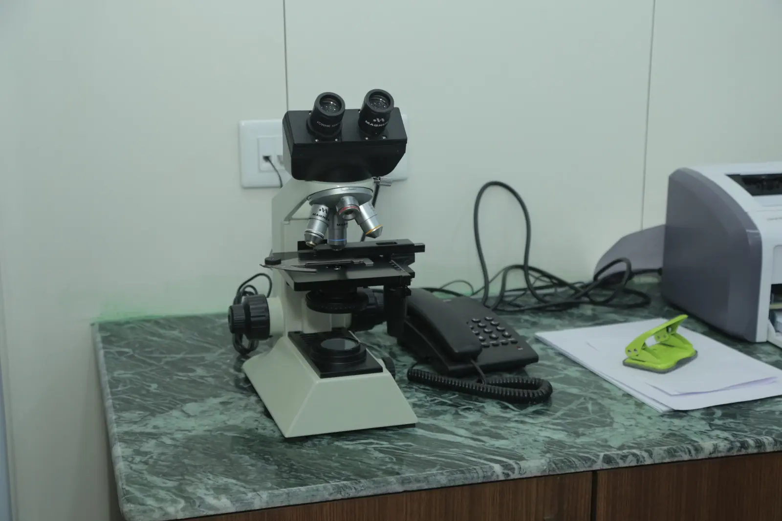 Diagnostic microscope in Apollo Clinic Jabalpur laboratory